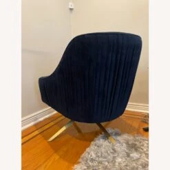 West Elm Roar + Rabbit Pleated Swivel Chair