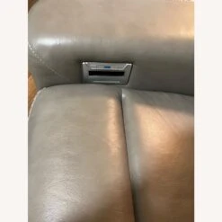 Ashley Furniture Beige Leather Power Recliner -Othe Furniture Store 1500 1500 frame 0 1934